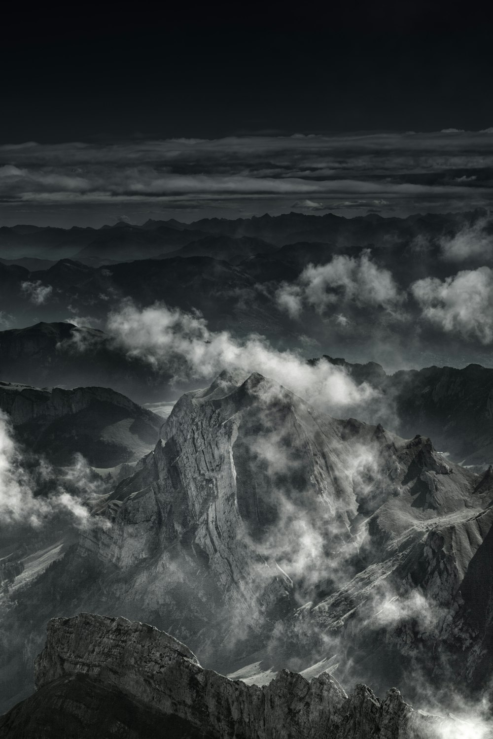 grayscale photo of mountain range