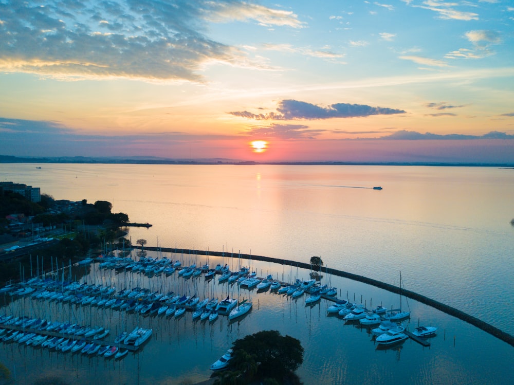 calm body of water during sunset