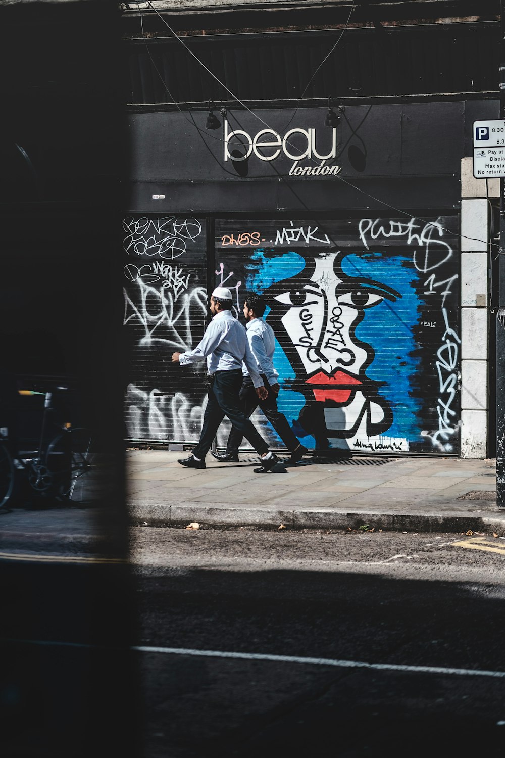 people walking on sidewalk