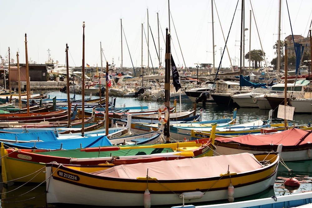 white and yellow canoe boat on deck