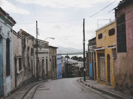 road between concrete houses in Santiago de Cuba Cuba
