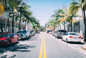 assorted cars parked side-by-side parking lot