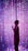 A woman stands in front of a dazzling array of LED lights that create a vibrant and immersive atmosphere. The lights form a curtain of pink, purple, and blue hues, with some bulbs varying in brightness to add depth and interest.