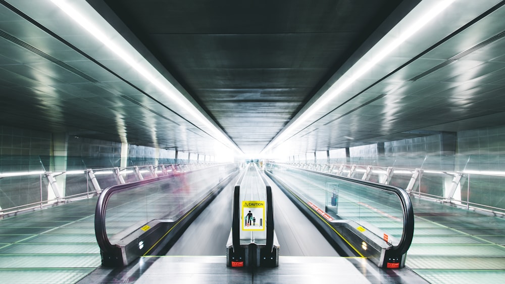 time lapse photography of black and gray escalator