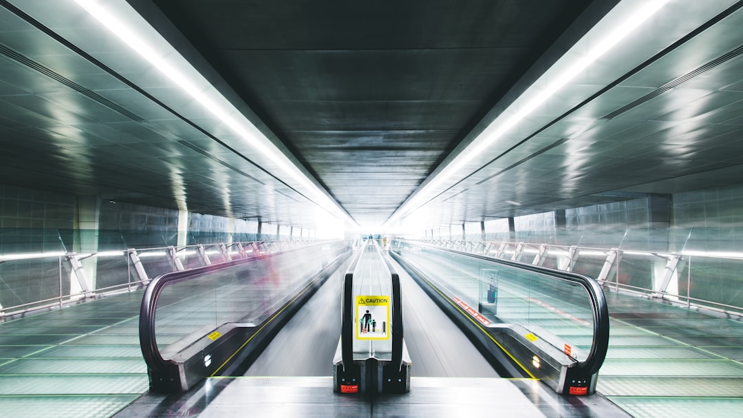 time lapse photography of black and gray escalator, Into The Future