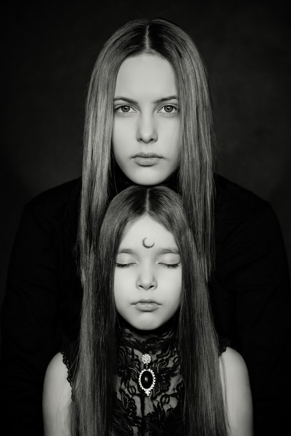 grayscale photography of two women