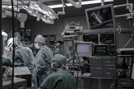 people wearing surgical clothes inside operating room
