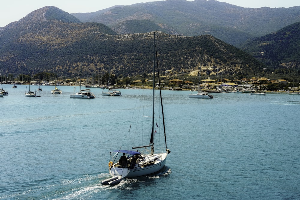 aerial photography of person inside boat on body of water