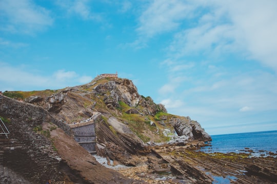 landscape photography of mountain near body of water in Gaztelugatxe Spain