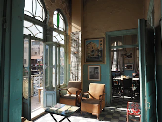 A bright, inviting open house with happy visitors exploring a beautifully staged living room.