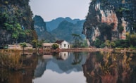 white house between two cliffs