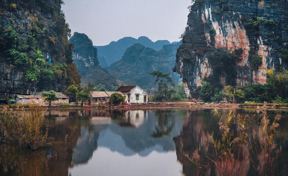 white house between two cliffs