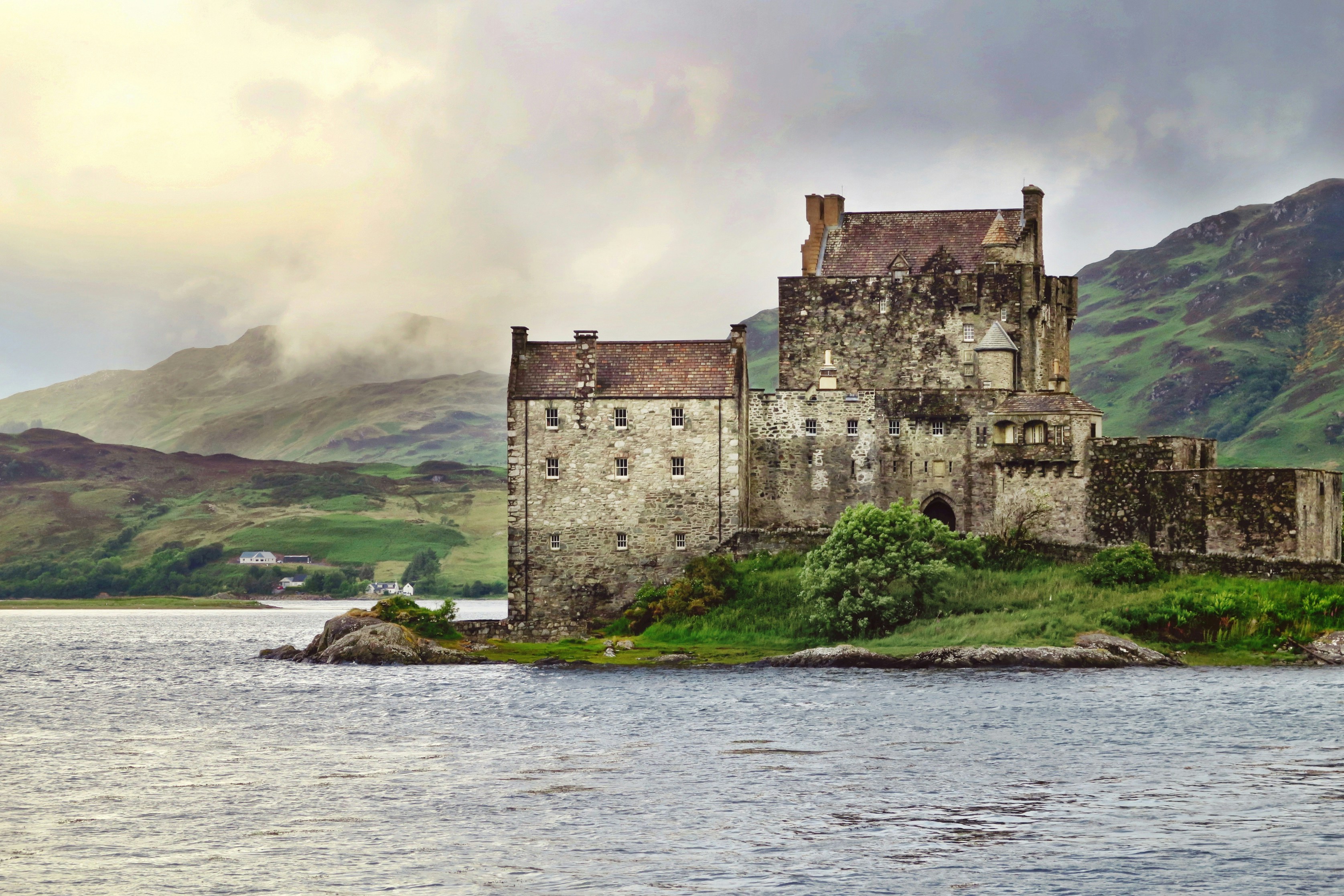 landscape photography of old building near body of water