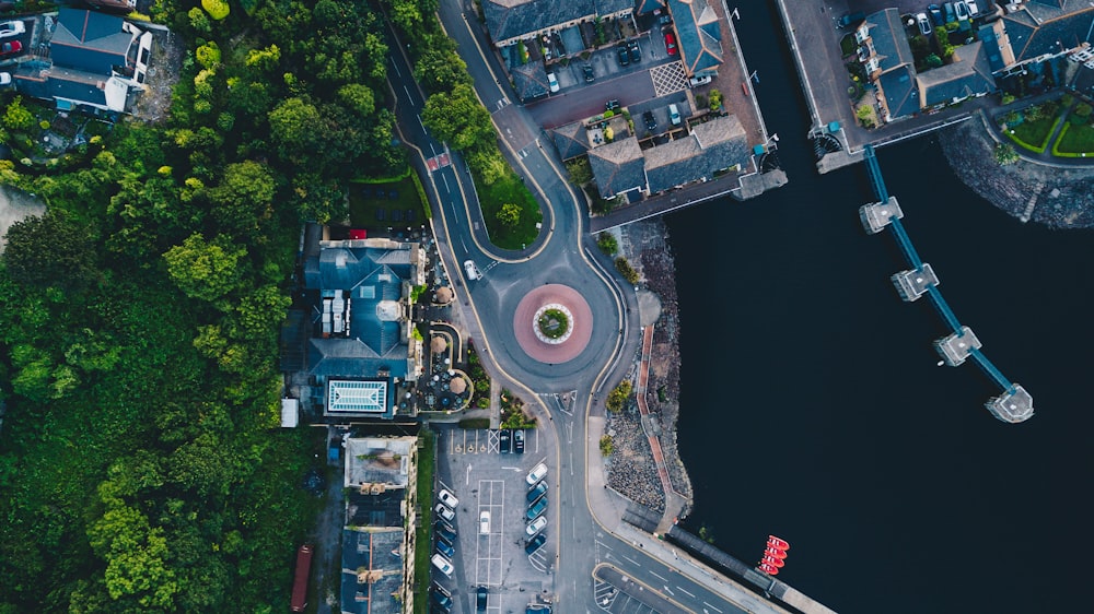 aerial photography of buildings near body of water