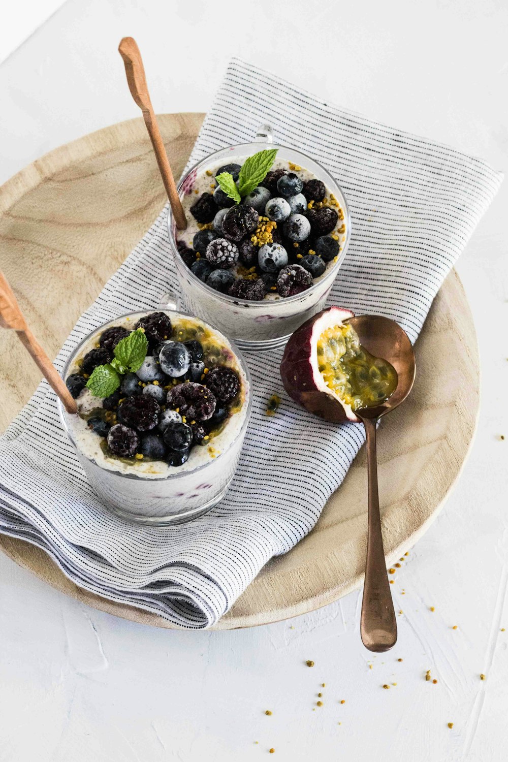 close-up photo of two glass filled with berries