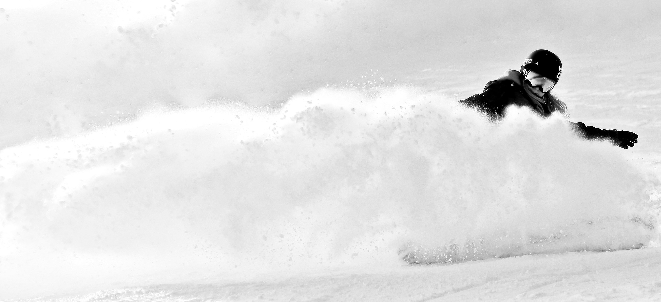 grayscale photography of person skiing