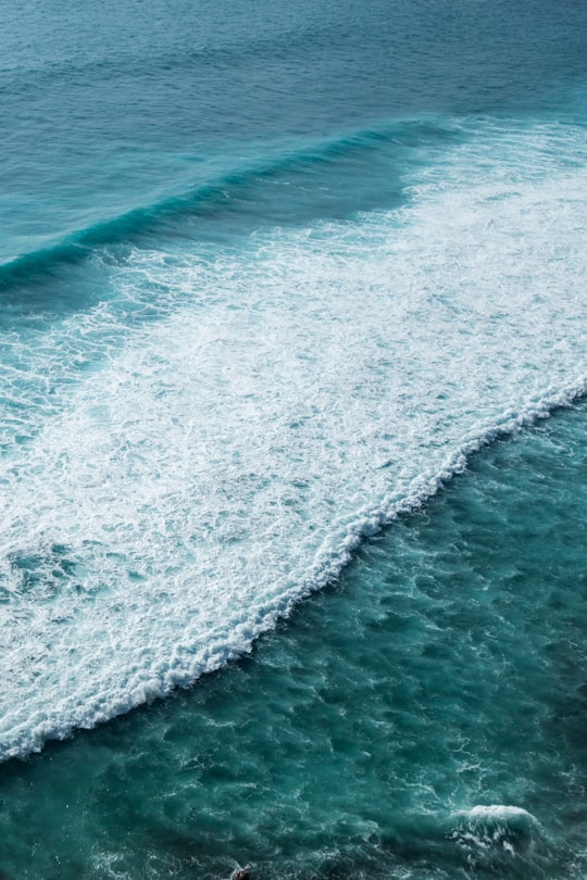 time lapse photography of body of water in Uluwatu Temple Indonesia