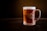 brown liquid on clear glass mug