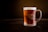 brown liquid on clear glass mug