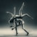 A couple performing an acrobatic dance pose, with one person balancing on one leg and supporting the other who is suspended upside down with legs outstretched. The scene is captured in a grayscale tone, highlighting the strength and grace of the dancers.