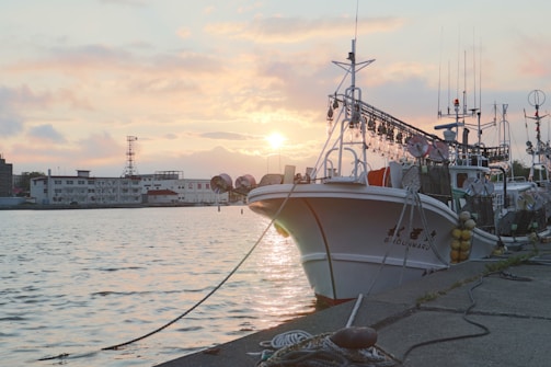A family enjoying a quiet afternoon fishing off a dock at Sunset Isle Yacht Club in Fort Walton Beach.