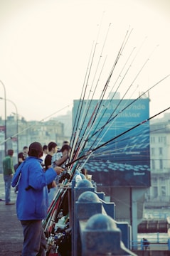 A group of diverse individuals enjoying a fishing event together.