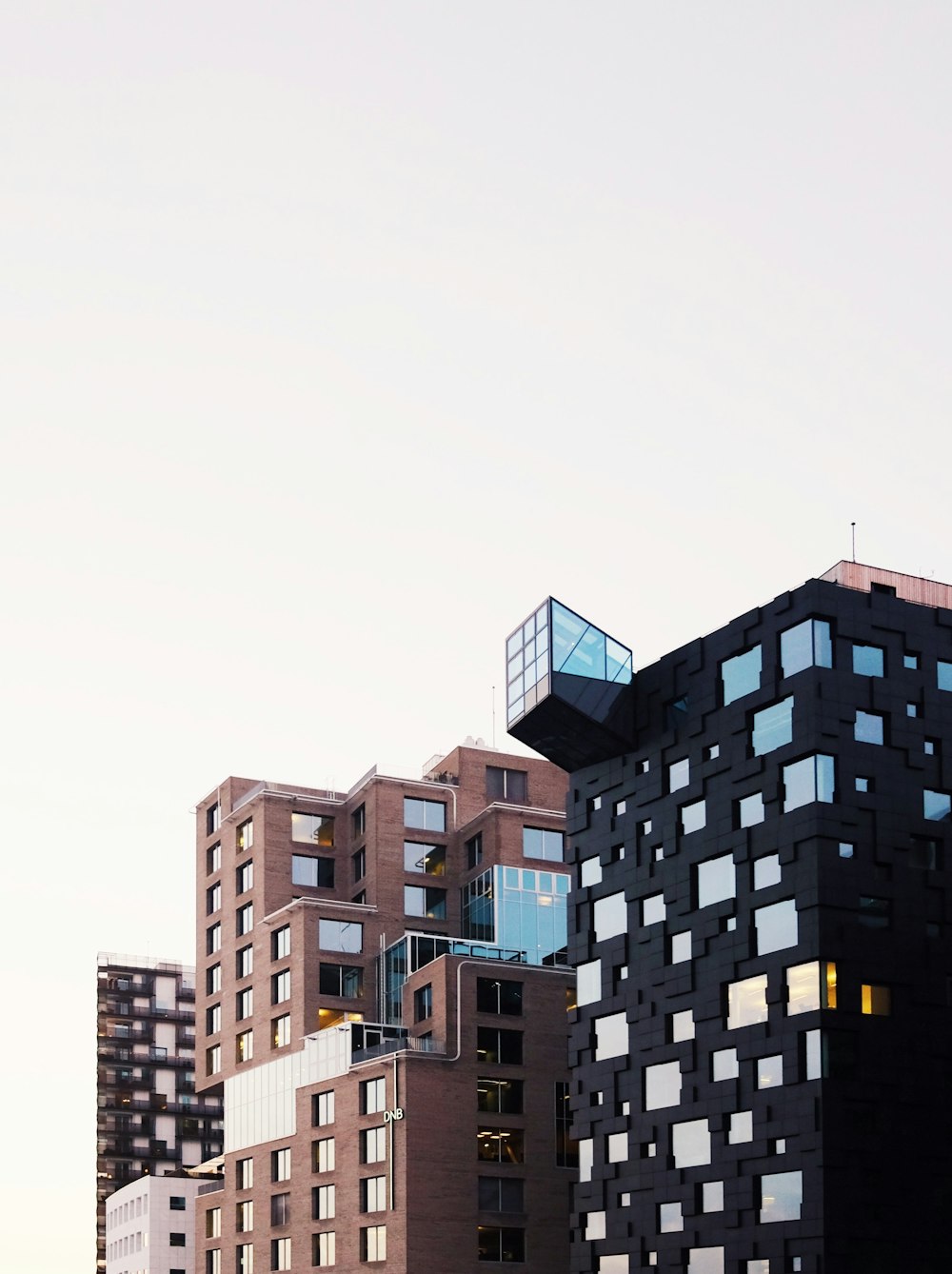 architectural photography of brown and black buildings