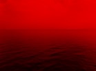 photo of ocean with red lights