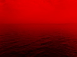 photo of ocean with red lights