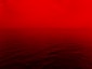 photo of ocean with red lights