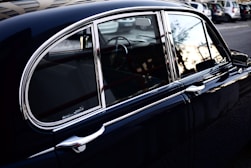 closeup photo of classic black car