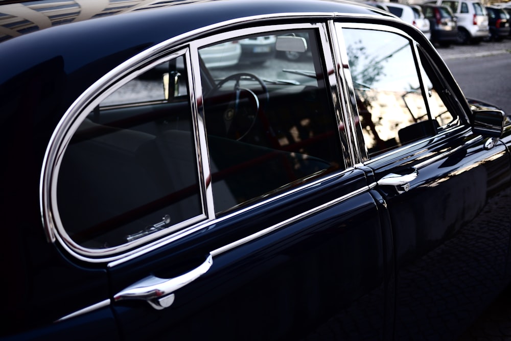 closeup photo of classic black car
