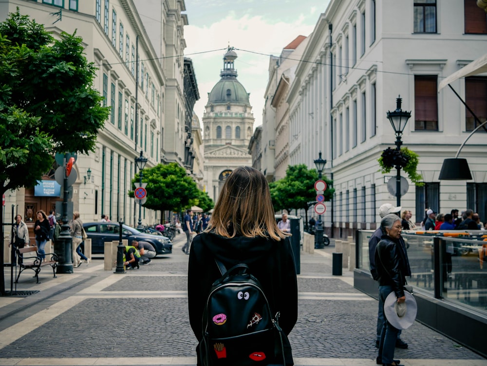 woman carrying backpack