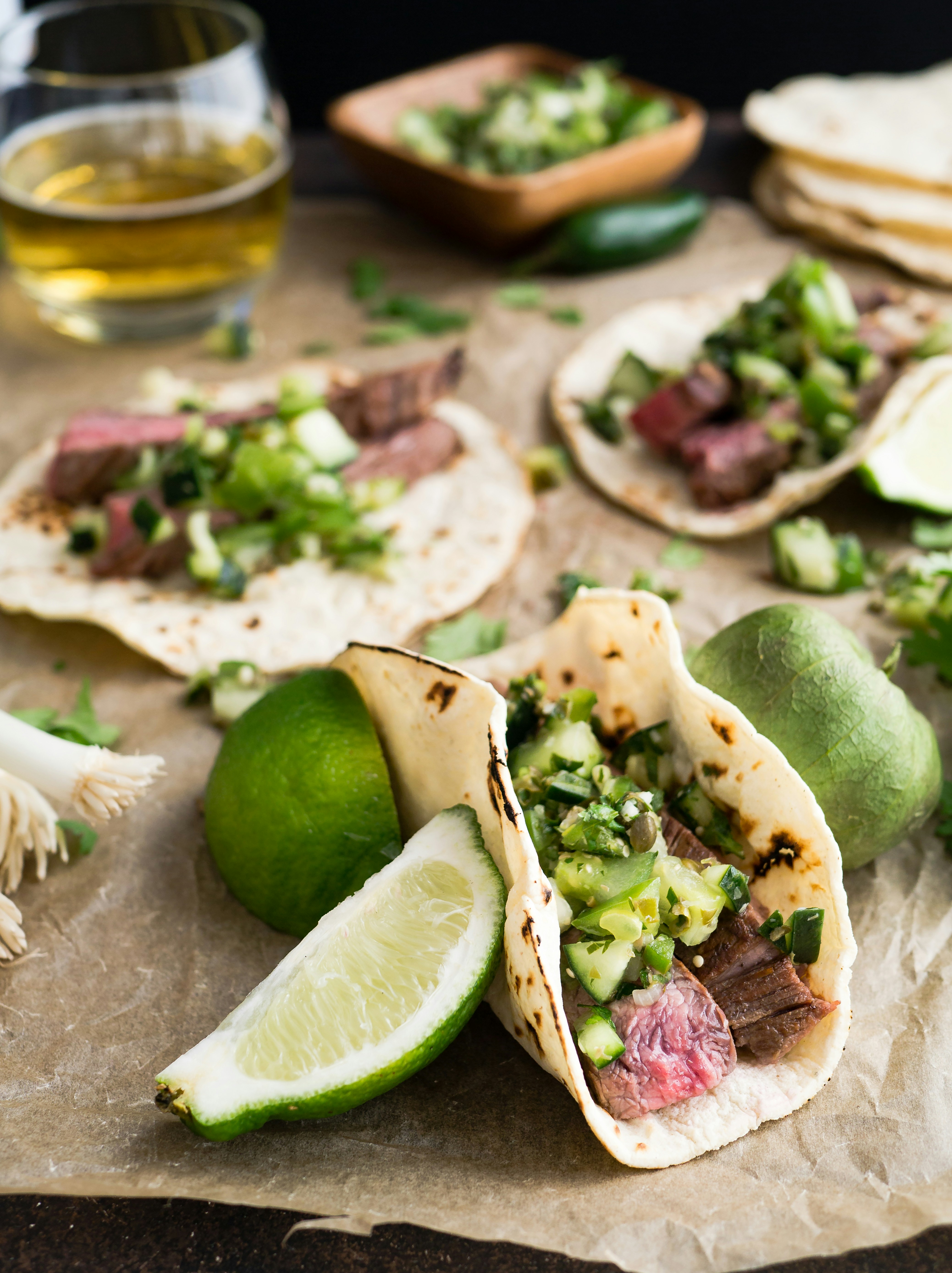I love this recipe for margarita marinated flank steak tacos and I love the festive, loose atmosphere of this photo. It makes me feel like I’m at a friendly, slightly chaotic party celebrating with friends on a warm evening. Dancing is bound to follow the meal.