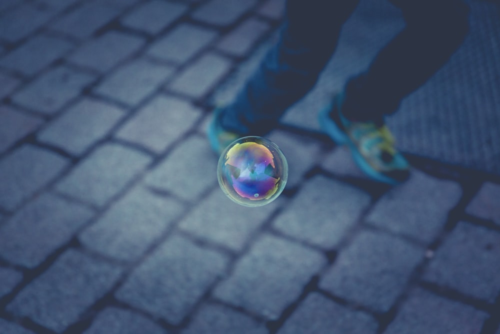 floating bubble near person running