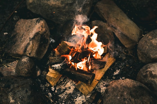 burn charcoal beside rocks in fyn Denmark