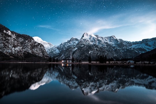 body of water surrounded with mountain in Almsee Austria