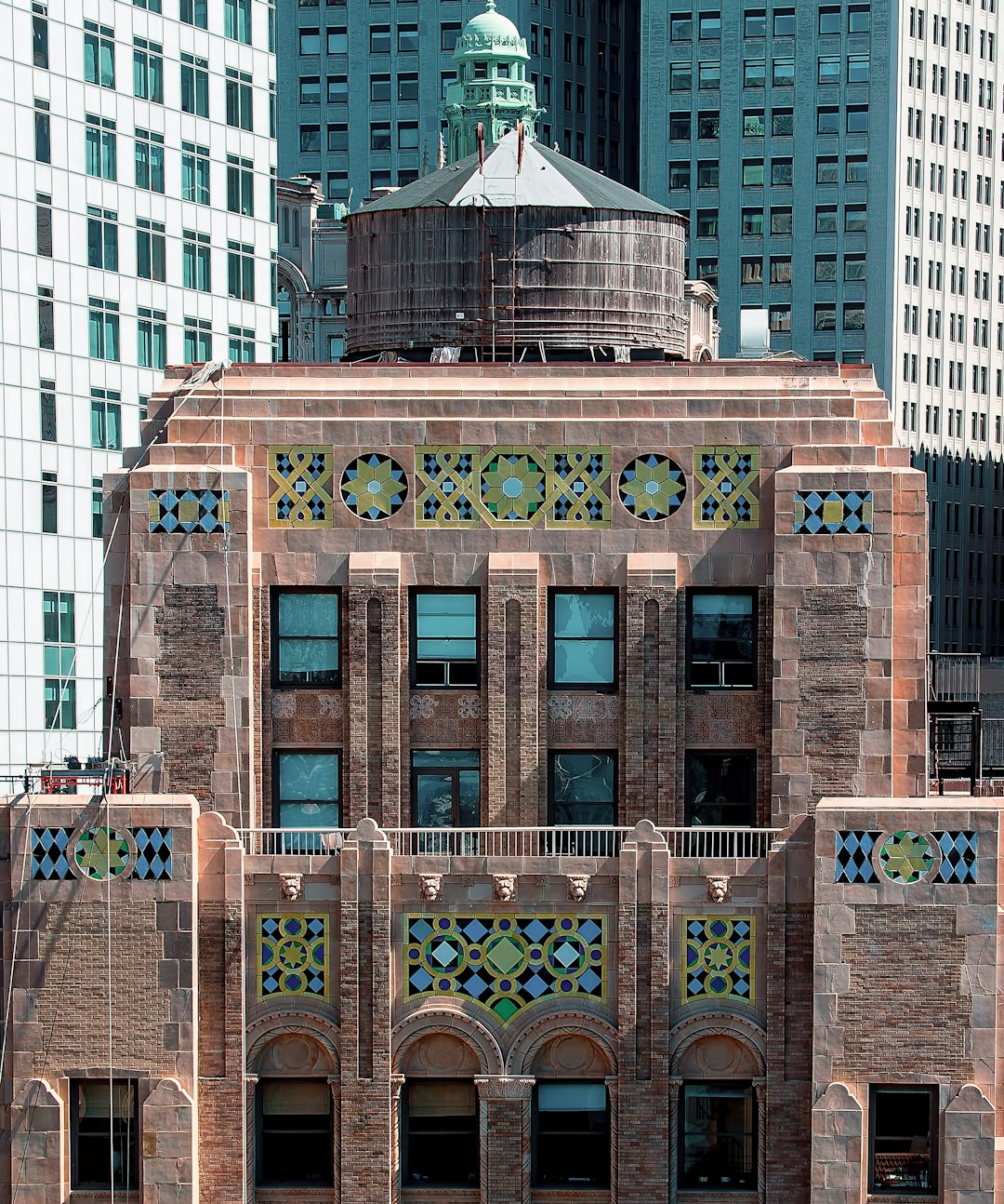 brown and green concrete multi-story building during daytime