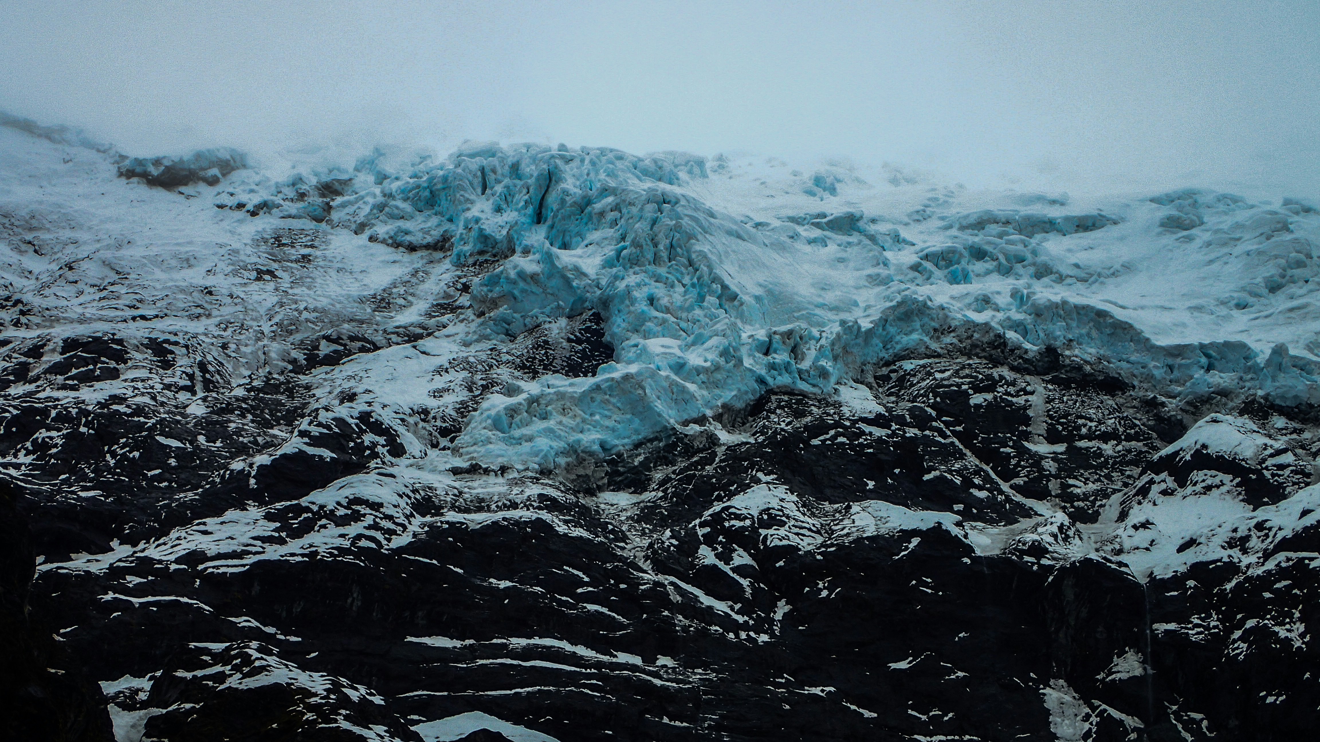 snow covered mountain during daytime south island teams background