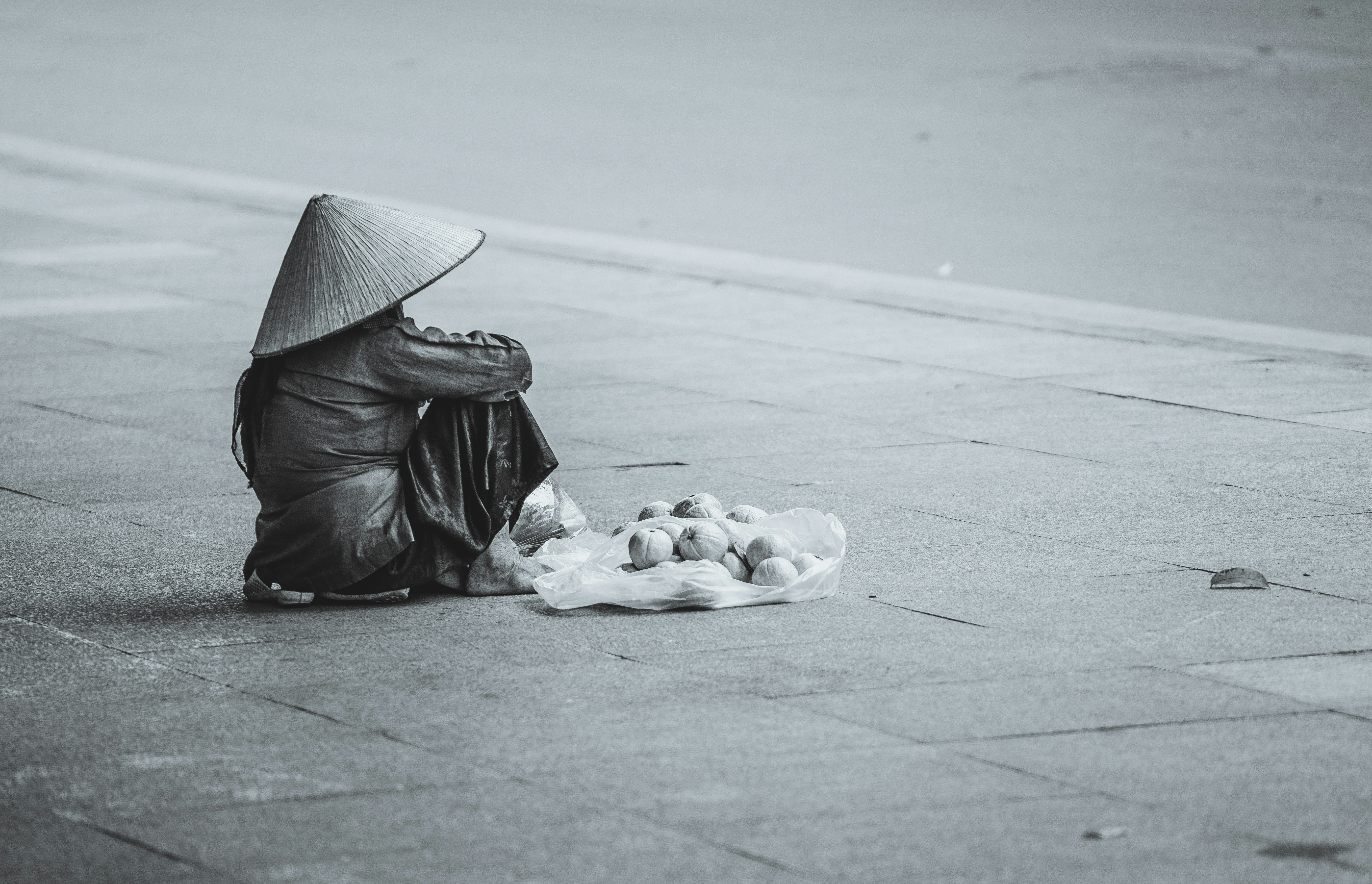 great photo recipe,how to photograph asian rain hat; person sitting beside street