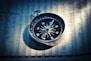shallow focus photograph of black and gray compass
