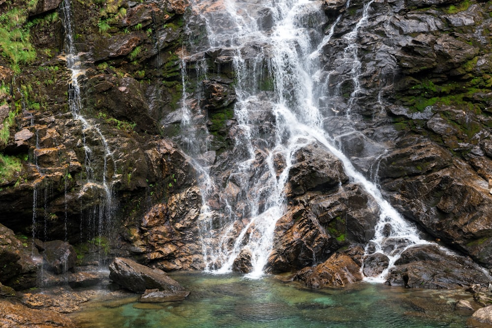 waterfalls on rock formation