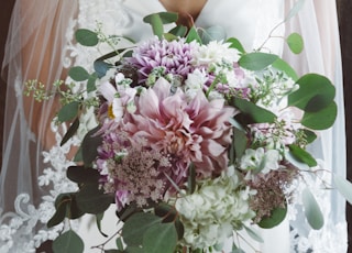 bride holding a bouquet of flower