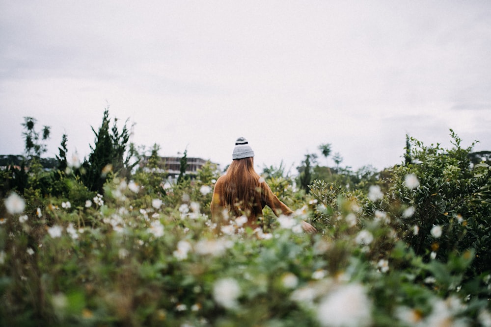 woman in white knit cap