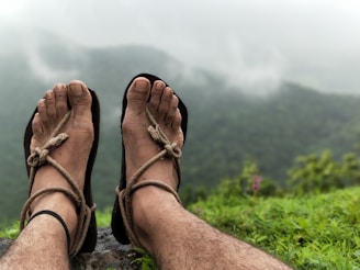 A close-up of breathable sandals against a natural backdrop.