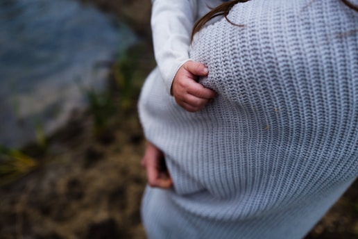 woman carrying baby
