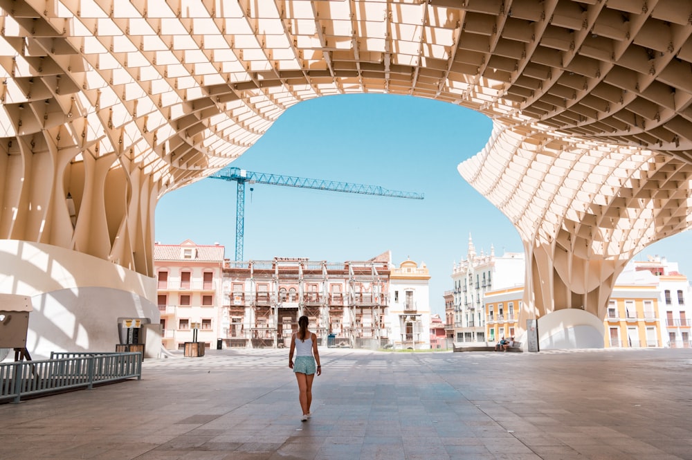 woman walking inside building