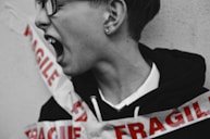 selective color photography of person portraying of being fragile
