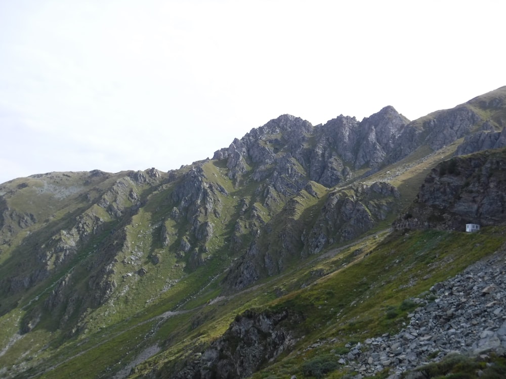 green and gray mountains under white sky during daytime