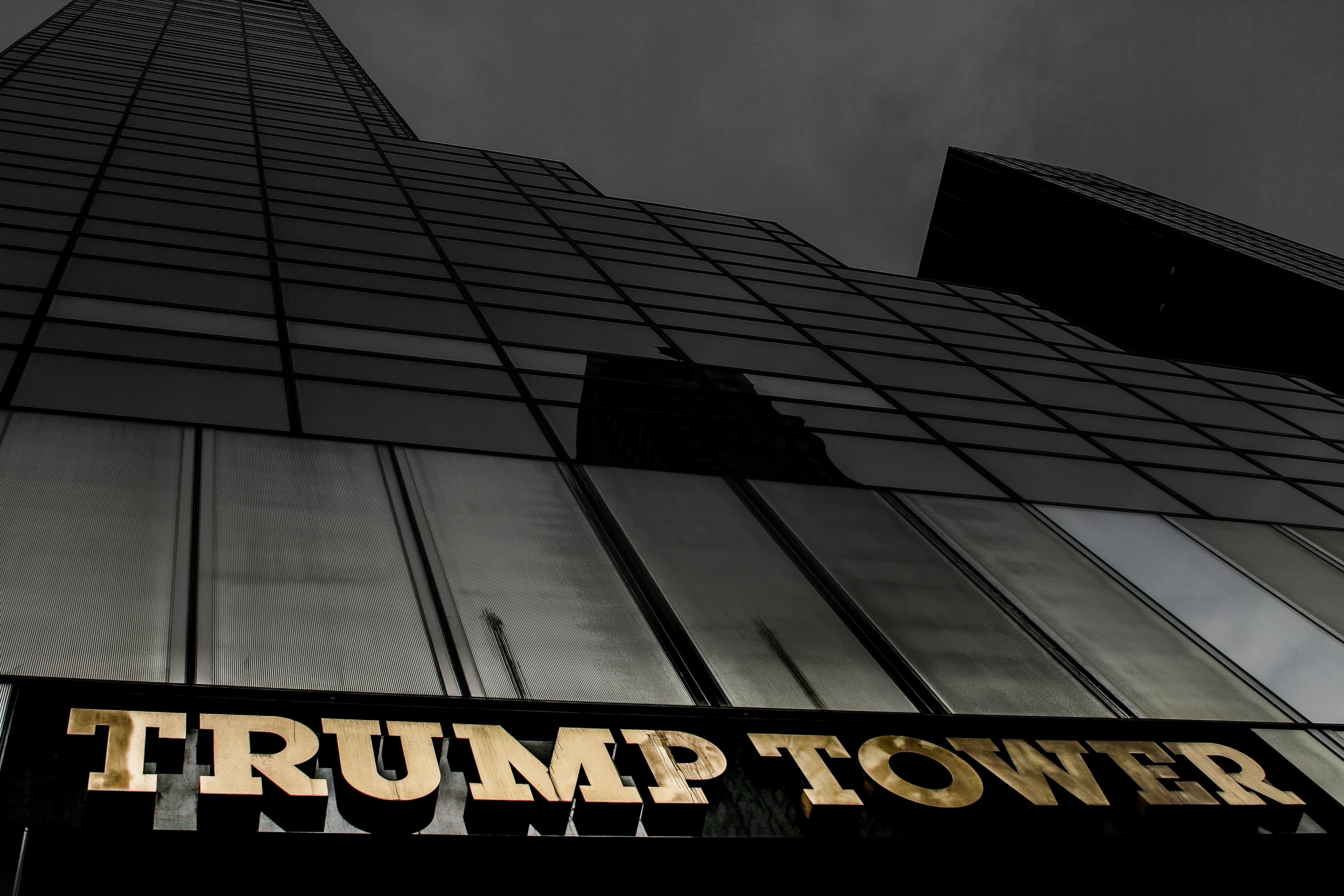 grayscale photo of Trump Tower